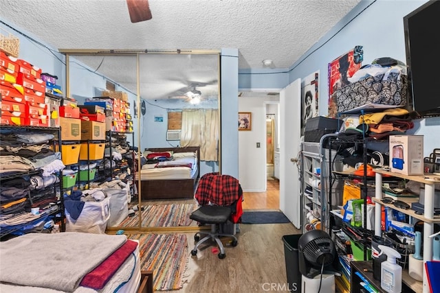 7614 Mason Ave, Winnetka, CA 91306 - office with ceiling fan, wood finished floors, and a textured ceiling