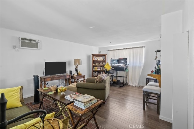 7614 Mason Ave, Winnetka, CA 91306 - living area with a wall unit AC, hardwood / wood-style floors, and baseboards
