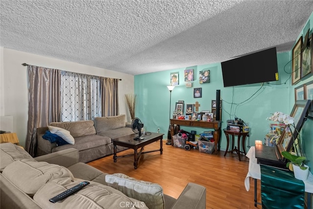 7614 Mason Ave, Winnetka, CA 91306 - living area with a textured ceiling and wood finished floors