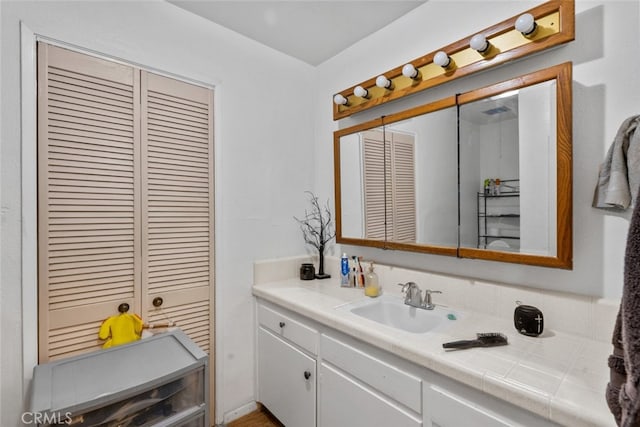 7614 Mason Ave, Winnetka, CA 91306 - bathroom featuring vanity and a closet
