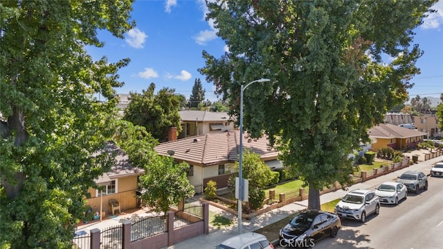 7614 Mason Ave, Winnetka, CA 91306 - exterior space with a residential view, a gate, and stucco siding