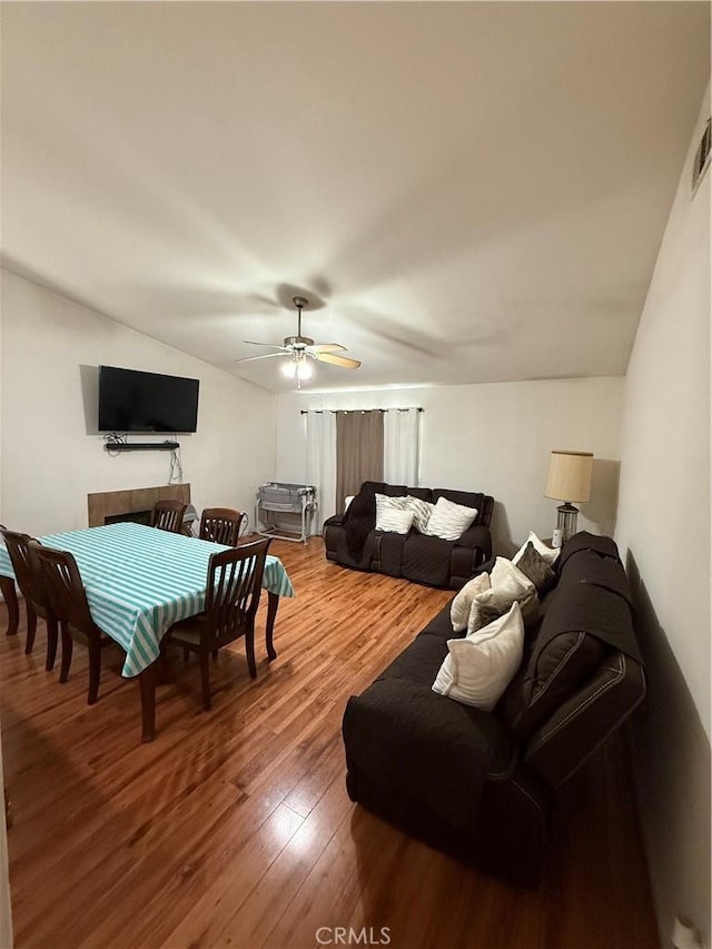 10333 Mendicino, Victorville, CA 92301 - living room with vaulted ceiling, wood finished floors, and a ceiling fan