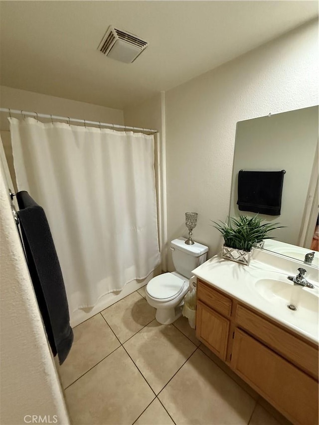 10333 Mendicino, Victorville, CA 92301 - bathroom with vanity, toilet, tile patterned floors, and curtained shower