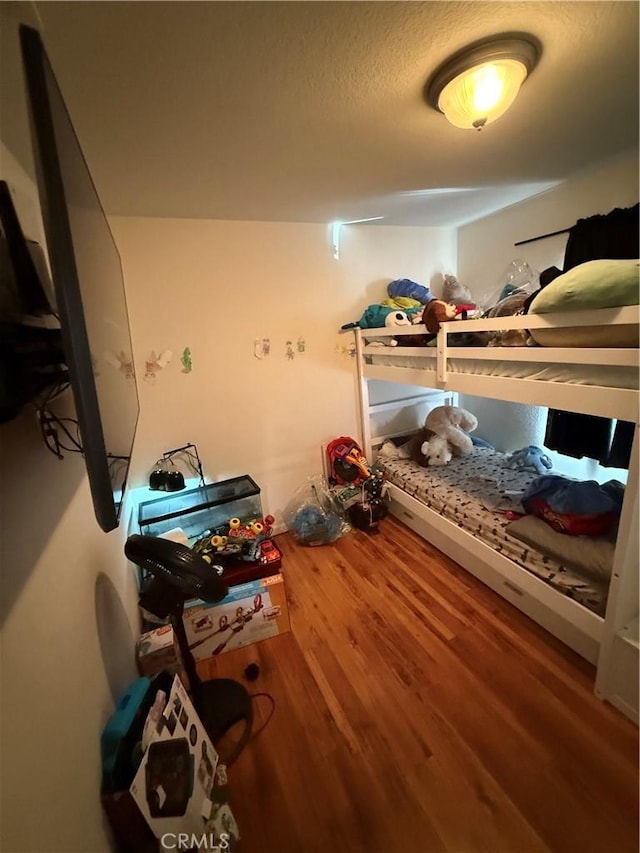 10333 Mendicino, Victorville, CA 92301 - bedroom with wood finished floors and a textured ceiling