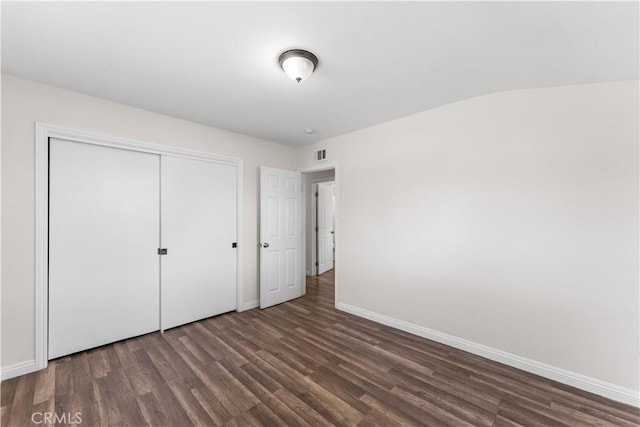 2398 Victoria St, San Bernardino, CA 92410 - unfurnished bedroom with wood finished floors, baseboards, and a closet