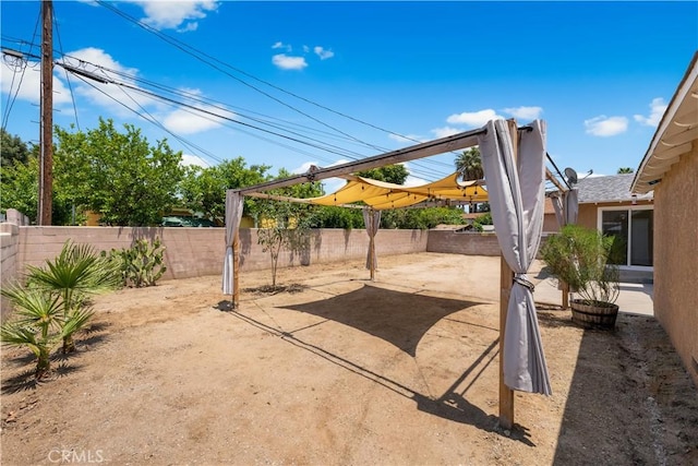 2398 Victoria St, San Bernardino, CA 92410 - fenced backyard with a patio
