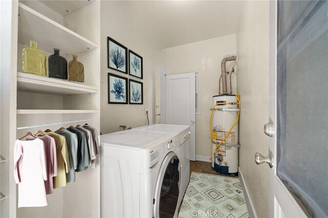 219 Redondo Ave, Long Beach, CA 90803 - washroom featuring water heater, washer and clothes dryer, light tile patterned flooring, and baseboards