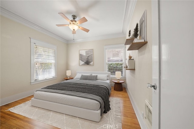 219 Redondo Ave, Long Beach, CA 90803 - bedroom with ornamental molding, light wood finished floors, baseboards, and ceiling fan