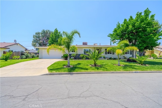 1016 N Marcella Ave, Rialto, CA 92376 - ranch-style home featuring driveway, stucco siding, and a garage