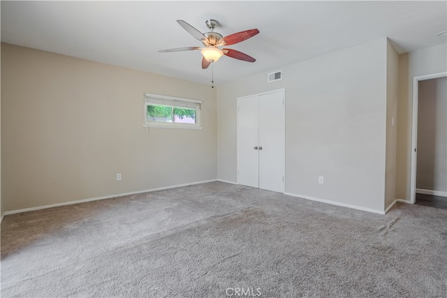 1016 N Marcella Ave, Rialto, CA 92376 - unfurnished bedroom with carpet, baseboards, a closet, and a ceiling fan