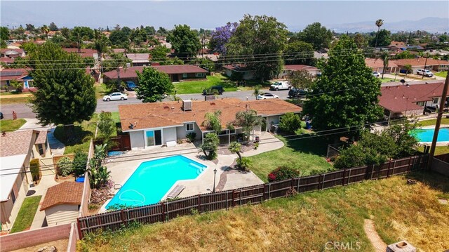 1016 N Marcella Ave, Rialto, CA 92376 - view from above of property featuring a pool area