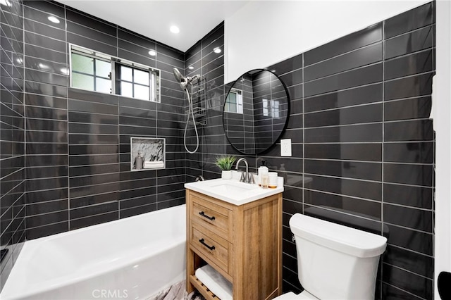 505 N Avon St, Burbank, CA 91505 - bathroom featuring vanity, shower / bathtub combination, toilet, and tile walls