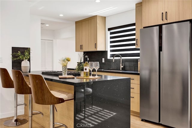 505 N Avon St, Burbank, CA 91505 - kitchen featuring freestanding refrigerator, a sink, light brown cabinetry, light wood-type flooring, and recessed lighting
