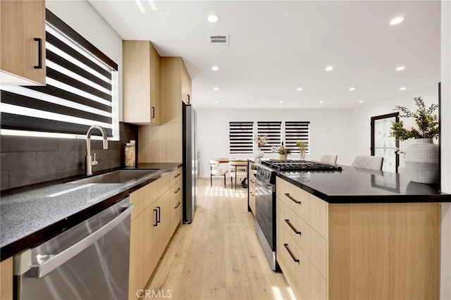 505 N Avon St, Burbank, CA 91505 - kitchen featuring light brown cabinets, stainless steel appliances, a sink, modern cabinets, and recessed lighting