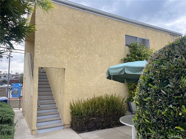 1728-1726 Midvale Ave, Los Angeles, CA 90024 - view of home's exterior with stucco siding and stairs