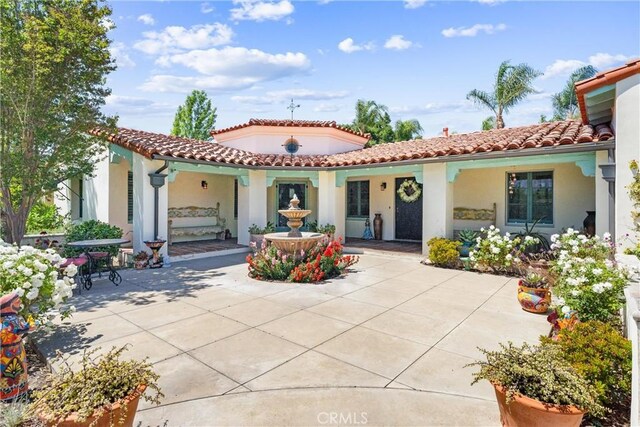 1422 Recado Rd, La Habra Heights, CA 90631 - view of front of property with stucco siding and a tile roof