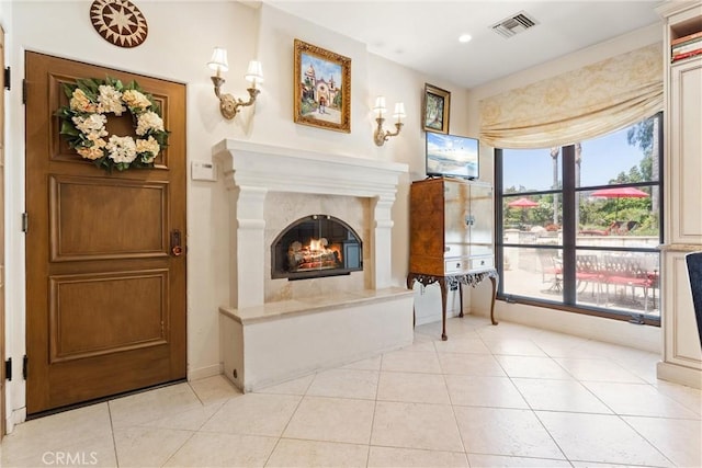 1422 Recado Rd, La Habra Heights, CA 90631 - unfurnished living room with plenty of natural light, a high end fireplace, baseboards, light tile patterned flooring, and recessed lighting