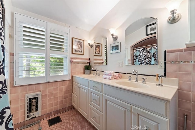 1422 Recado Rd, La Habra Heights, CA 90631 - full bathroom with heating unit, tile walls, double vanity, tile patterned floors, and lofted ceiling