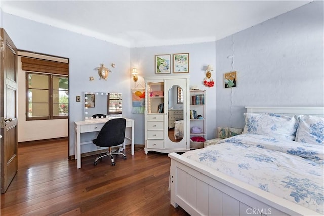 1422 Recado Rd, La Habra Heights, CA 90631 - bedroom with dark wood finished floors and an office area
