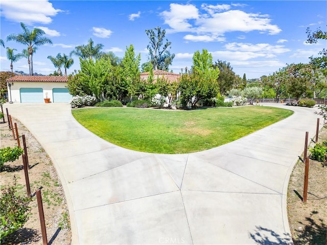1422 Recado Rd, La Habra Heights, CA 90631 - view of home's community with a lawn, a garage, and driveway