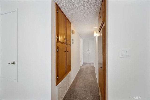 1750 Prefumo Canyon Rd Unit 17, San Luis Obispo, CA 93405 - hall with light carpet and a textured ceiling