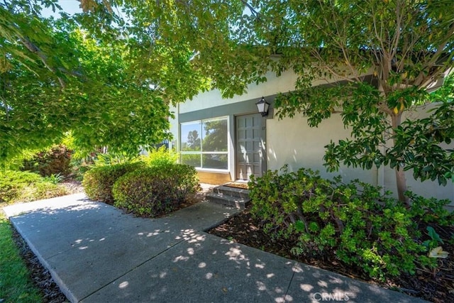 1750 Prefumo Canyon Rd Unit 17, San Luis Obispo, CA 93405 - entrance to property with a patio area and stucco siding