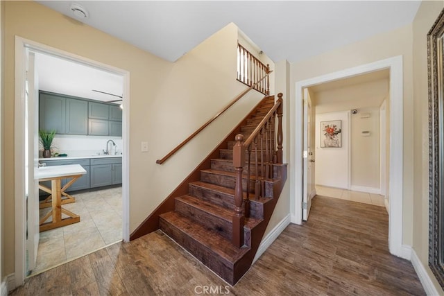 23929 Sunset Crossing Rd, Diamond Bar, CA 91765 - staircase featuring wood finished floors and baseboards