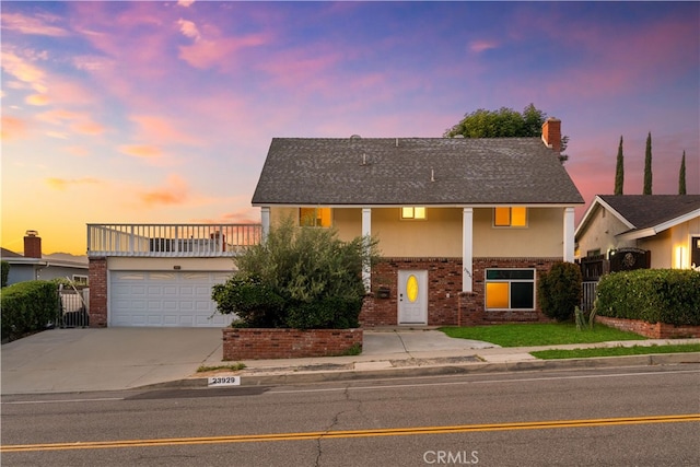 23929 Sunset Crossing Rd, Diamond Bar, CA 91765 - view of front of property featuring brick siding, driveway, a chimney, and a garage