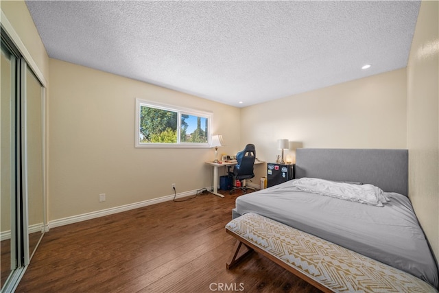 23929 Sunset Crossing Rd, Diamond Bar, CA 91765 - bedroom with wood finished floors, a textured ceiling, baseboards, a closet, and recessed lighting