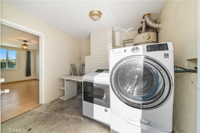 23929 Sunset Crossing Rd, Diamond Bar, CA 91765 - laundry area with washer / dryer and water heater