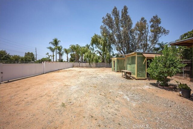 6391 Stearns St, Riverside, CA 92504 - view of yard featuring exterior structure and an outdoor structure