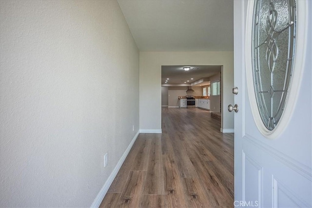 6391 Stearns St, Riverside, CA 92504 - entryway with wood finished floors and baseboards