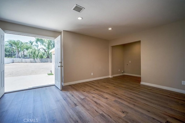 6391 Stearns St, Riverside, CA 92504 - unfurnished room featuring wood finished floors, baseboards, and recessed lighting