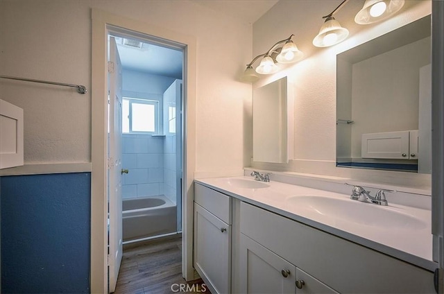 6391 Stearns St, Riverside, CA 92504 - bathroom featuring double vanity and wood finished floors