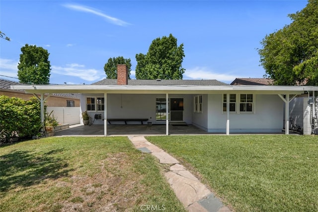 6130 Longridge Ave, Valley Glen, CA 91401 - rear view of property with a chimney, stucco siding, and a patio