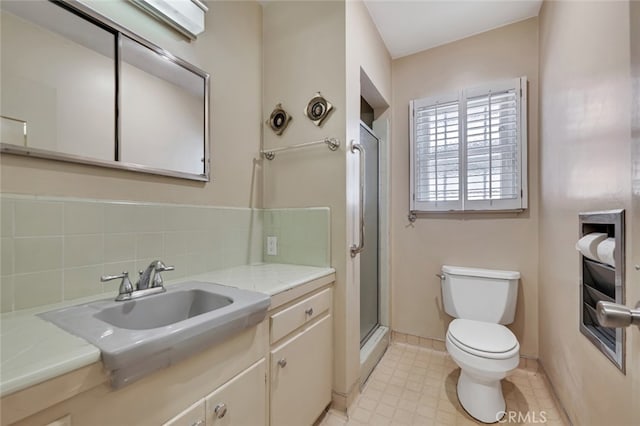 6130 Longridge Ave, Valley Glen, CA 91401 - bathroom featuring toilet, vanity, a shower with shower door, and baseboards