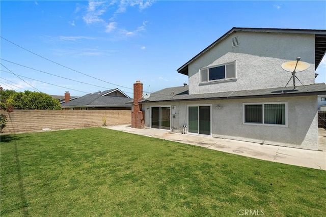 10172 Merrimac Dr, Huntington Beach, CA 92646 - rear view of property featuring stucco siding and a patio