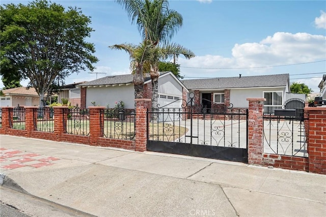 1304 N Devonshire Rd, Anaheim, CA 92801 - ranch-style home with a fenced front yard, stucco siding, and driveway