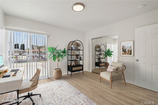1304 N Devonshire Rd, Anaheim, CA 92801 - home office with light wood-style flooring and baseboards