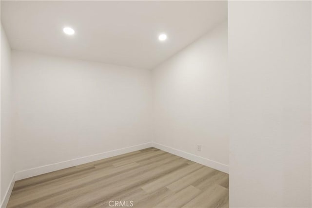414 Markton St, Los Angeles, CA 90061 - spare room featuring light wood-style flooring, recessed lighting, and baseboards