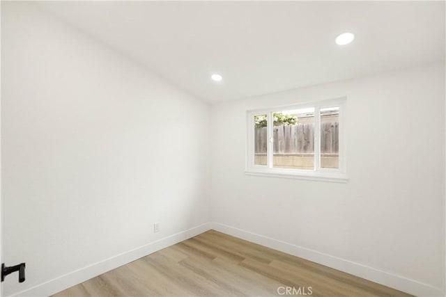 414 Markton St, Los Angeles, CA 90061 - unfurnished room featuring baseboards, light wood-style floors, and recessed lighting
