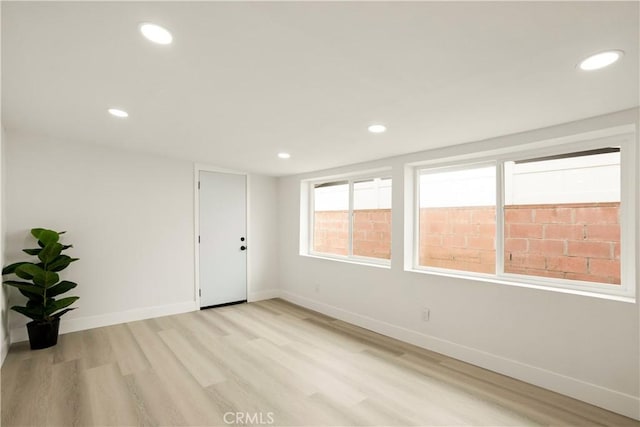 414 Markton St, Los Angeles, CA 90061 - empty room featuring light wood-style floors, baseboards, and recessed lighting