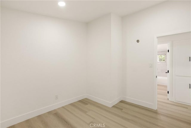 414 Markton St, Los Angeles, CA 90061 - unfurnished room featuring light wood-style floors, baseboards, and recessed lighting