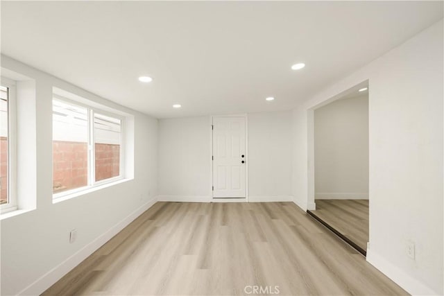 414 Markton St, Los Angeles, CA 90061 - empty room featuring light wood-style flooring, recessed lighting, and baseboards