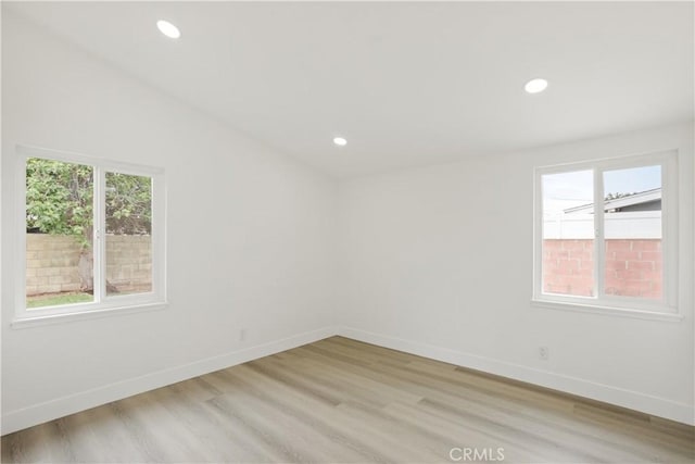 414 Markton St, Los Angeles, CA 90061 - spare room featuring light wood-style floors, baseboards, and recessed lighting