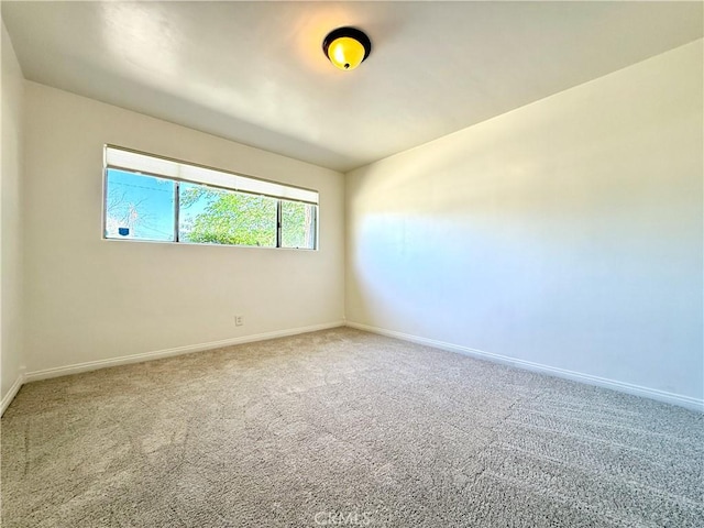 44037 Fern Ave, Lancaster, CA 93534 - unfurnished room featuring carpet flooring and baseboards