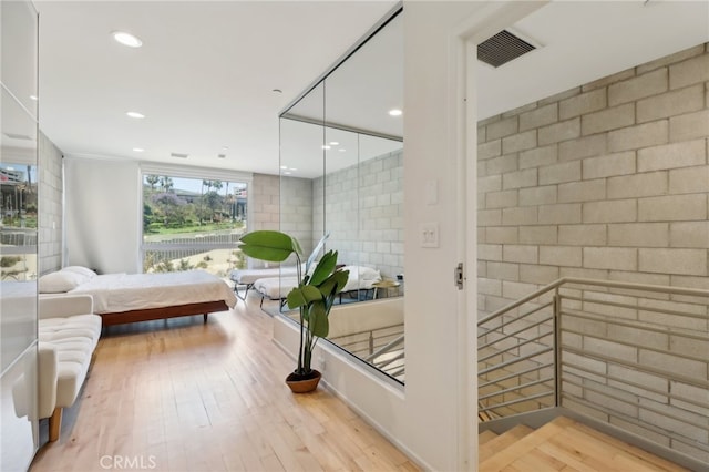 3450 Cahuenga Blvd W Unit 905, Los Angeles, CA 90068 - bedroom featuring wood finished floors and recessed lighting