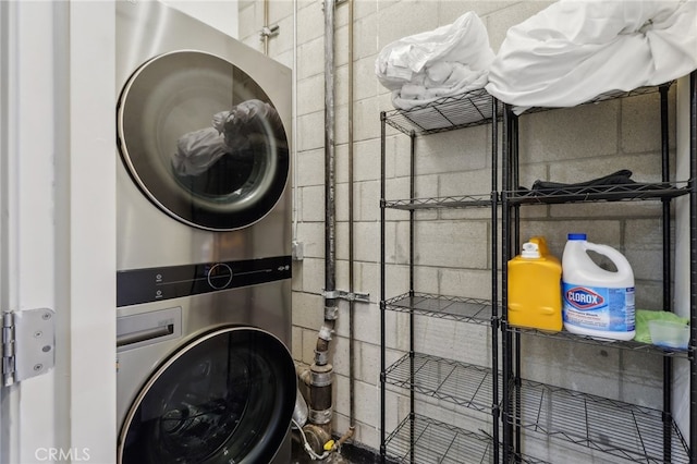 3450 Cahuenga Blvd W Unit 905, Los Angeles, CA 90068 - laundry room featuring stacked washing machine and dryer