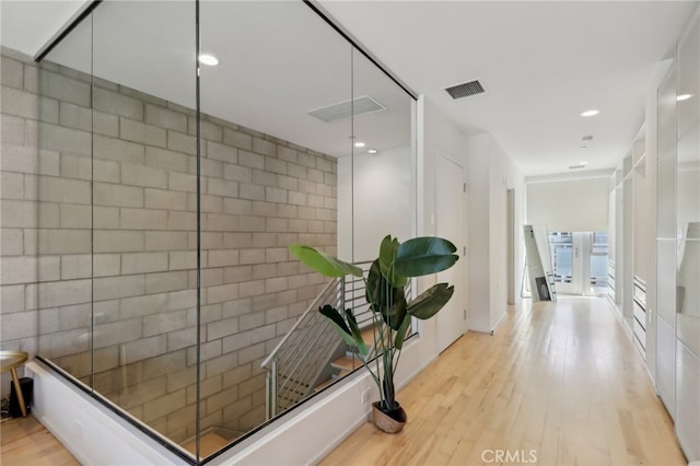 3450 Cahuenga Blvd W Unit 905, Los Angeles, CA 90068 - corridor with wood finished floors and recessed lighting