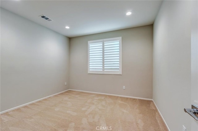 13139 Upland Ct, Hesperia, CA 92344 - spare room with light colored carpet, baseboards, and recessed lighting